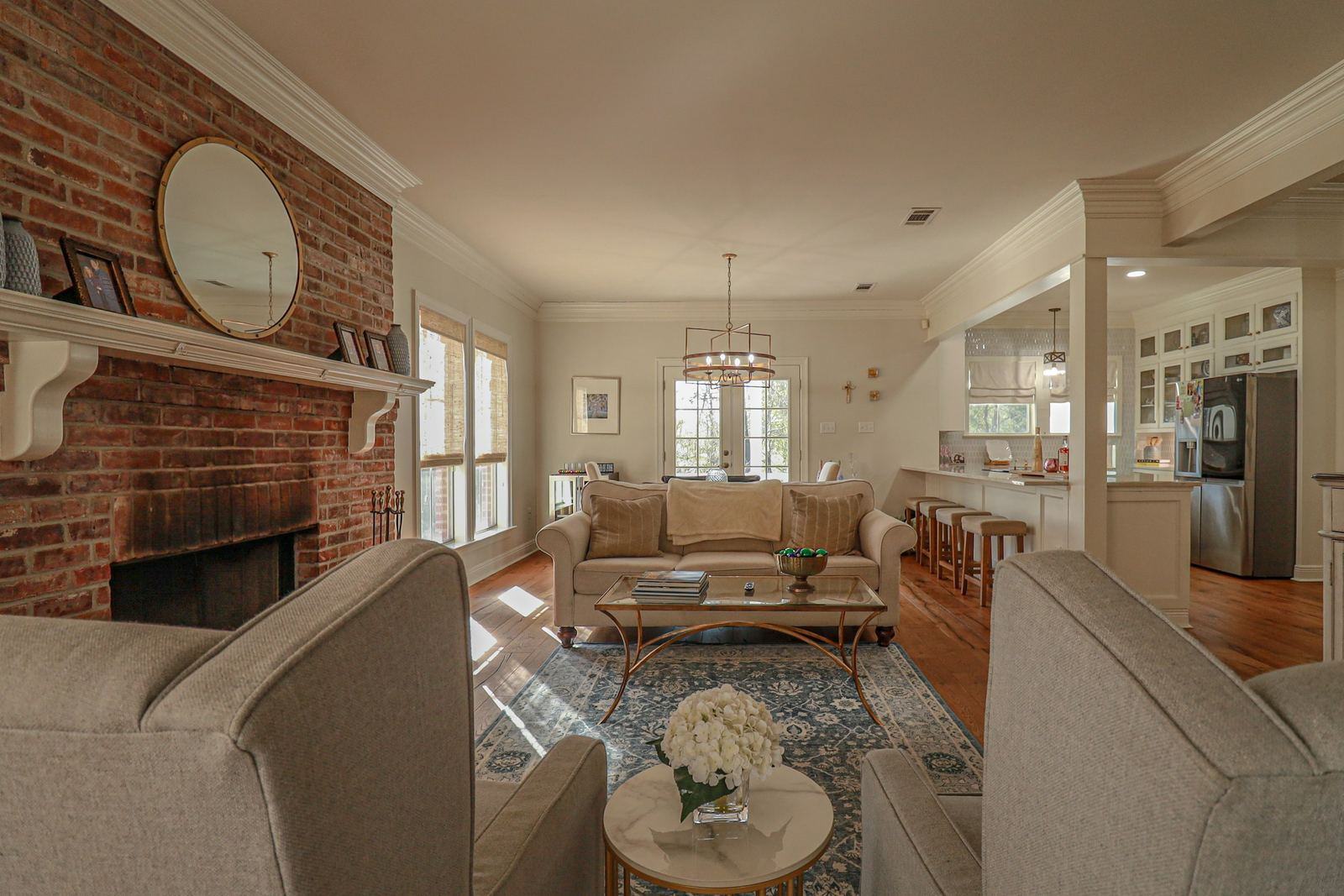 Living room with a brick fireplace